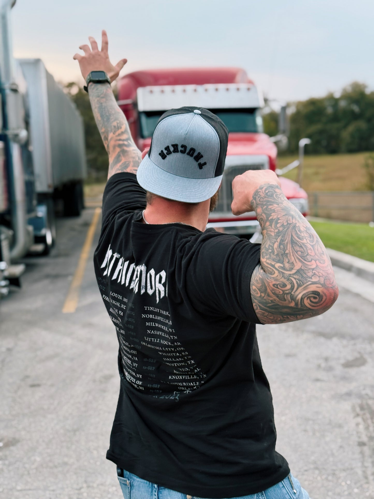 TRUCKER black logo